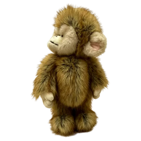 Kong seen from the side, showing the layered fur across the back and the low, wide ears
