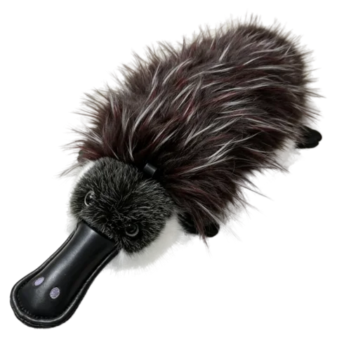 Platy, a realistic platypus plush with a glossy leather-look duck bill and dense dark fur